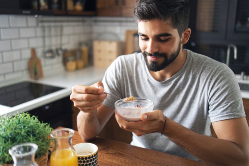 Man enjoying hangover breakfast